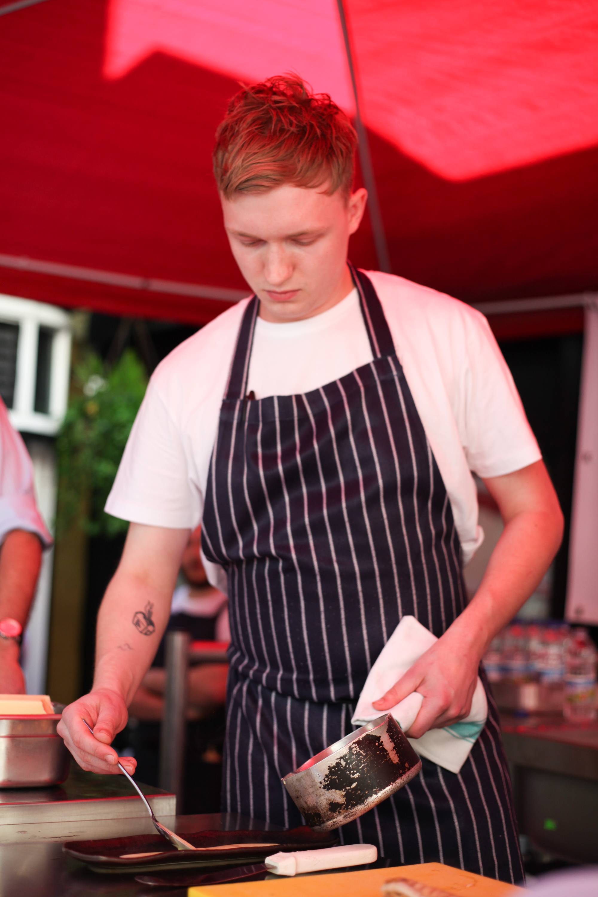 Winner Tristan preparing his dish